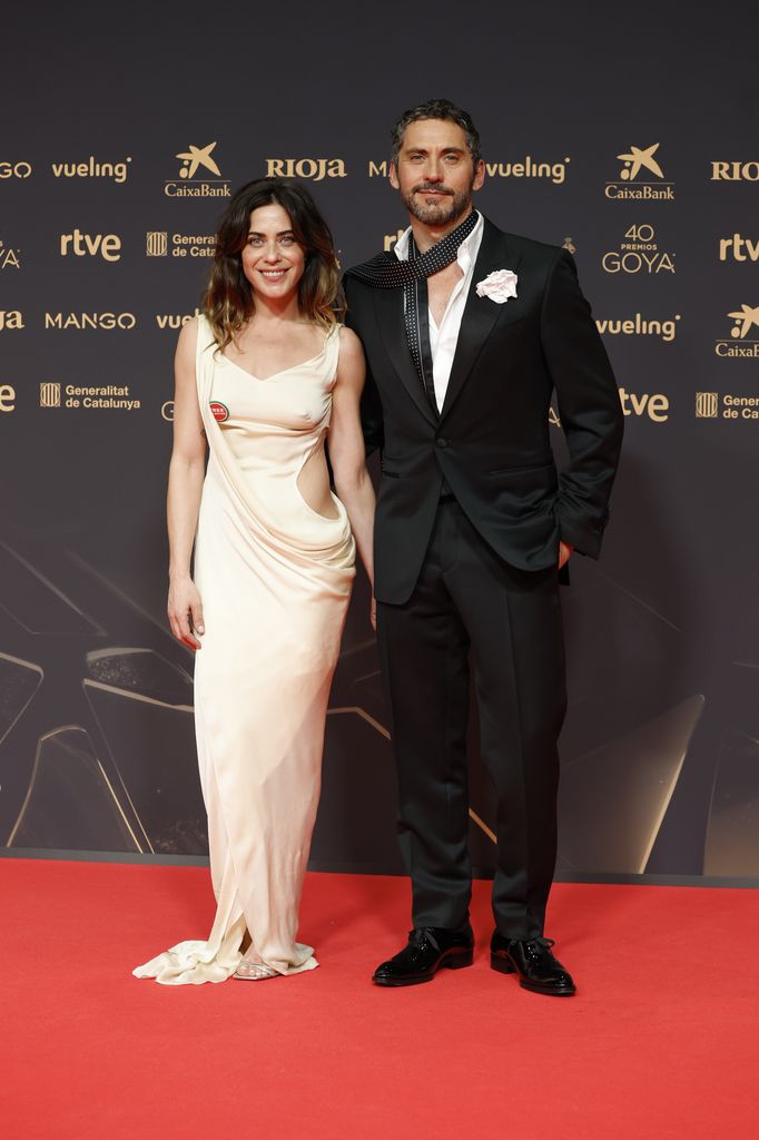 Paco y María León posing on a red carpet in formalwear during the Goya Awards 2026 in Barcelona, Spain, on Saturday, 28 February 2026.