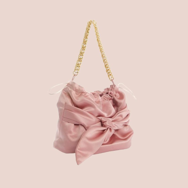 Bolso rosa con lazo de Alexah