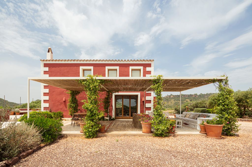 Casa unifamiliar con porche de cañizo