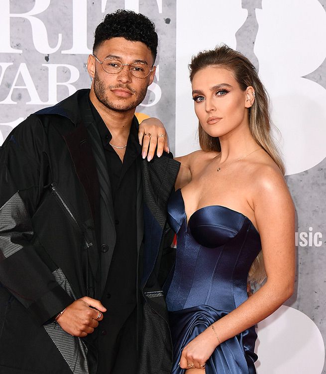 Perrie Edwards y Alex Oxlade-Chamberlain en los BRIT de 2019