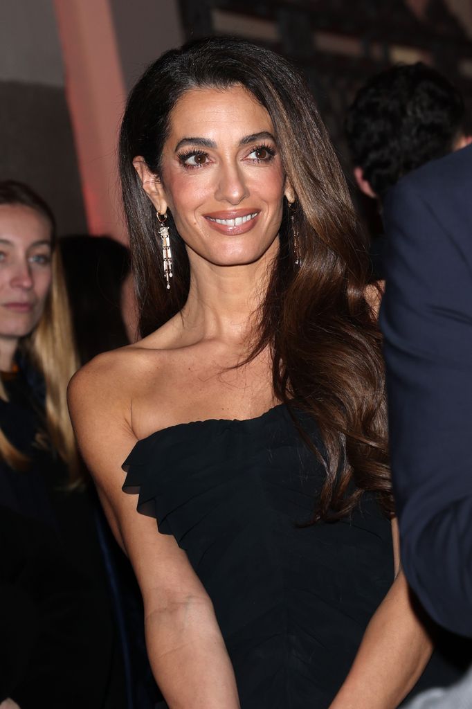 George Clooney y Amal Clooney en la fiesta de Omega House durante los Juegos Olímpicos de Invierno Milano Cortina 2026.
