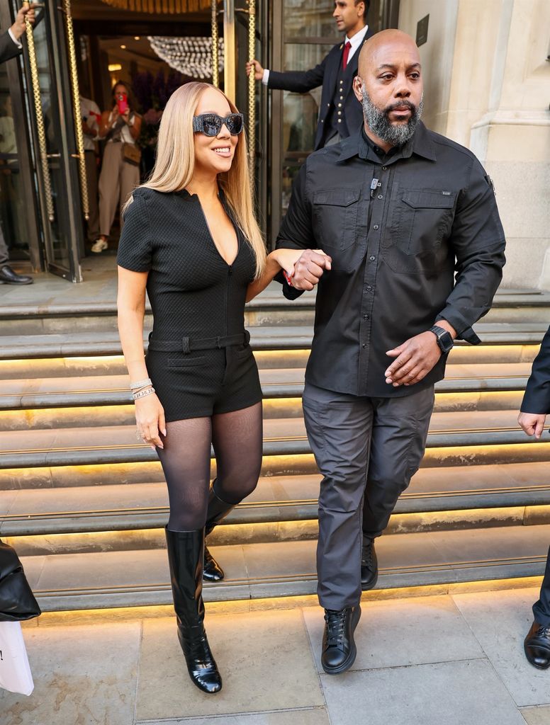 Mariah Carey en diva con botas altas de charol.