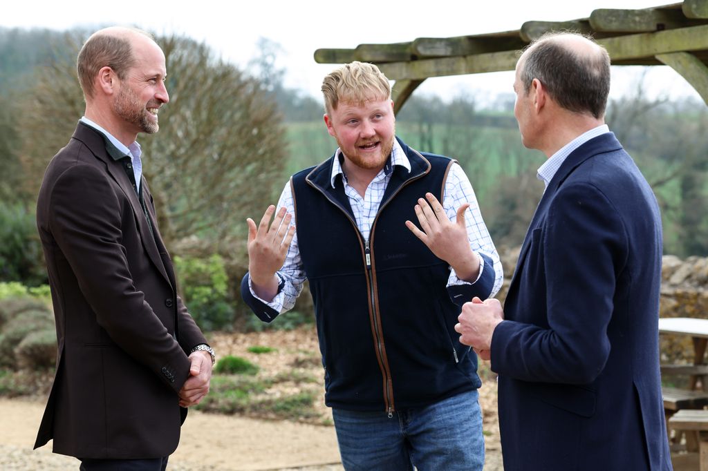 Prince William, Prince of Wales (L) speaks with Clarkson's Farm stars Kaleb Cooper (C) and Charlie Ireland (R) during an event for sixty of the Duchy of Cornwall's next generation of farming tenants, on March 26, 2025 in Pensford, England