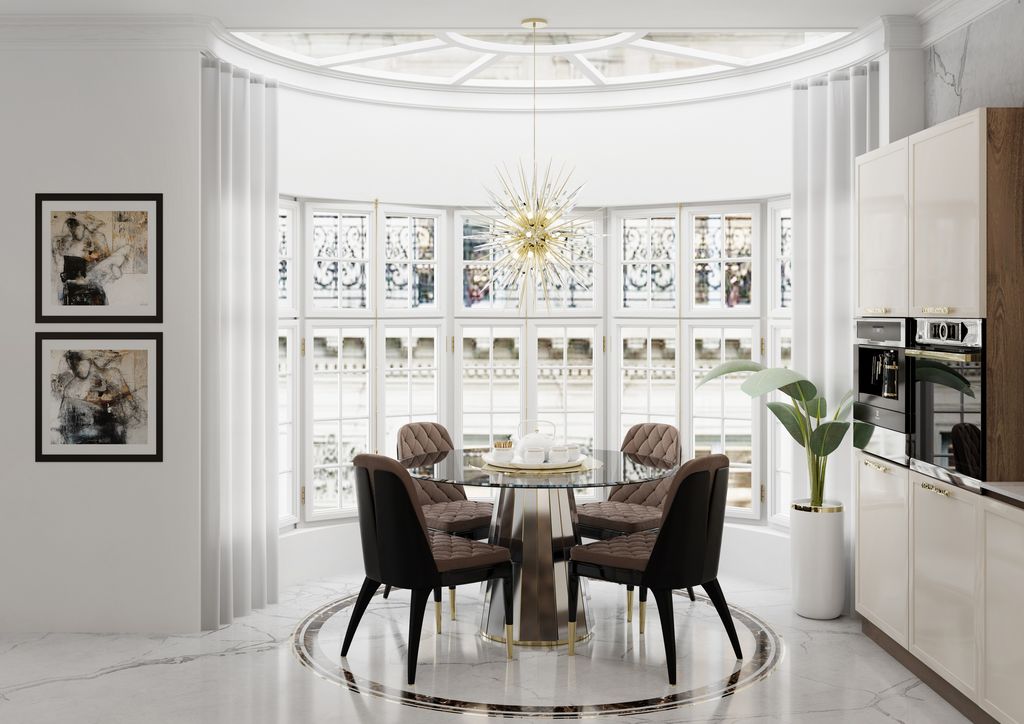 Elegante ‘office’ con mesa redonda y sillas tapizadas