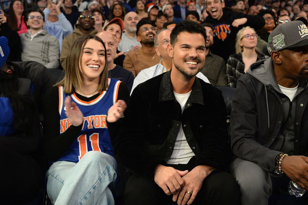 El actor y su mujer en un partido de la NBA