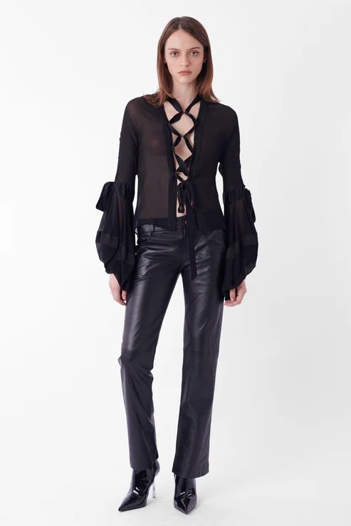 Blusa de Yves Saint Laurent by Tom Ford Fall Winter 2002.