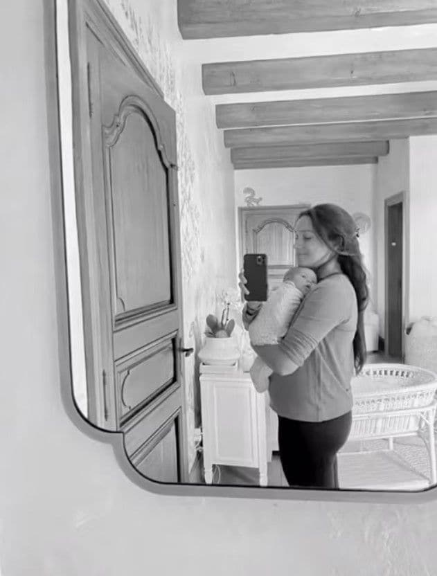 Meghan holding baby Princess Lilibet at Montecito mansion