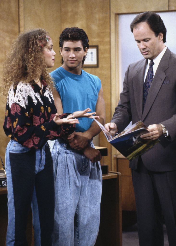 SAVED BY THE BELL -- Pictured: (l-r) Elizabeth Berkley as Jessie Spano, Mario Lopez as A.C. Slater, Dennis Haskins as Richard Belding -- Photo by: Alice S. Hall/NBCU Photo Bank