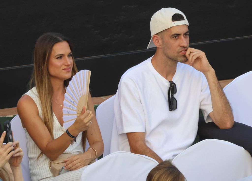 Sergio Busquets y Elena Galera