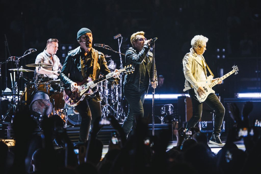 LONDON, ENGLAND - OCTOBER 25:  Larry Mullen Jr,The Edge, Bono and Adam Clayton of U2 perform at The O2 Arena on October 25, 2015 in London, England.  (Photo by Joseph Okpako/Redferns)
