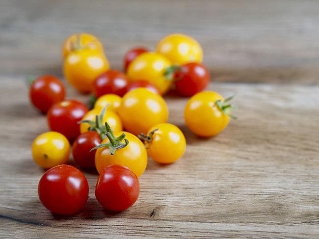Tomates amarillos y anaranjados