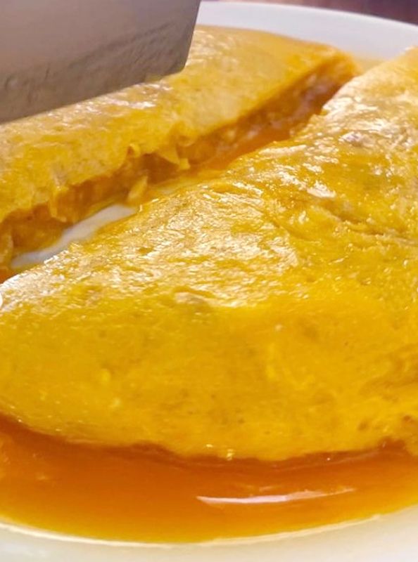 Tortilla del restaurante La Muralla, con el huevo muy líquido. 