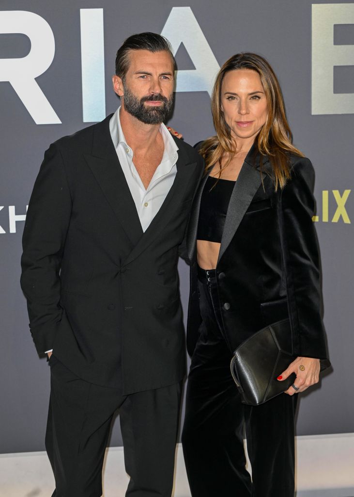 Mel C y su marido, en la presentación del documental de Victoria Beckham