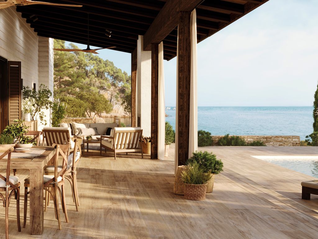 Los parquets cerámicos de Porcelanosa aportan la calidez de la madera, mientras que las colecciones de inspiración pétrea crean una imagen atemporal y muy versátil.