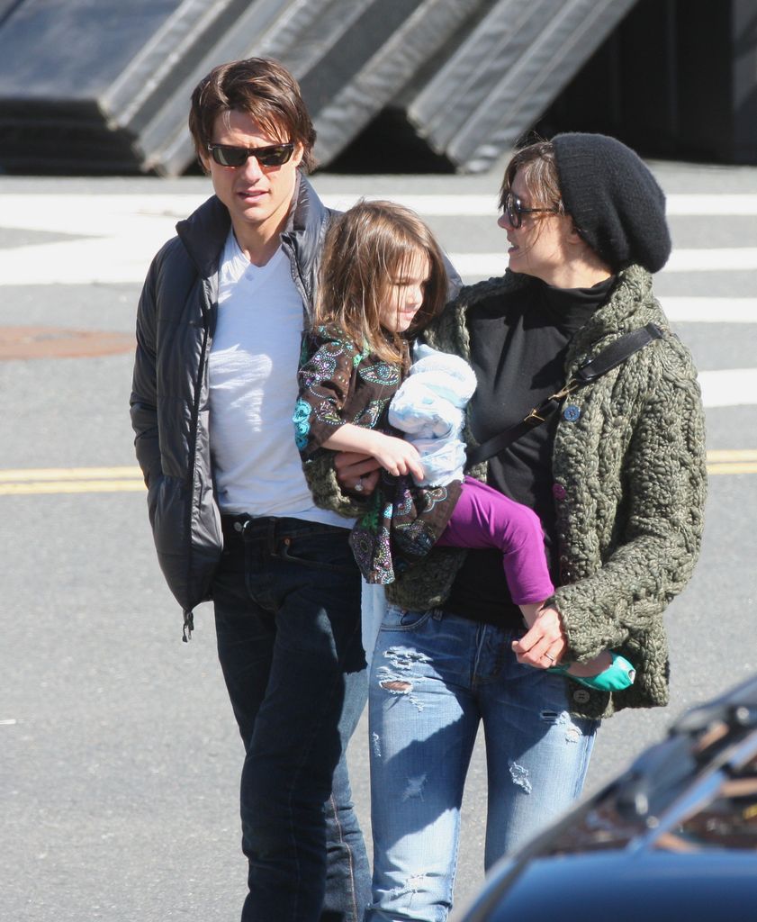 Tom Cruise y Katie Holmes junto a su hija, Suri