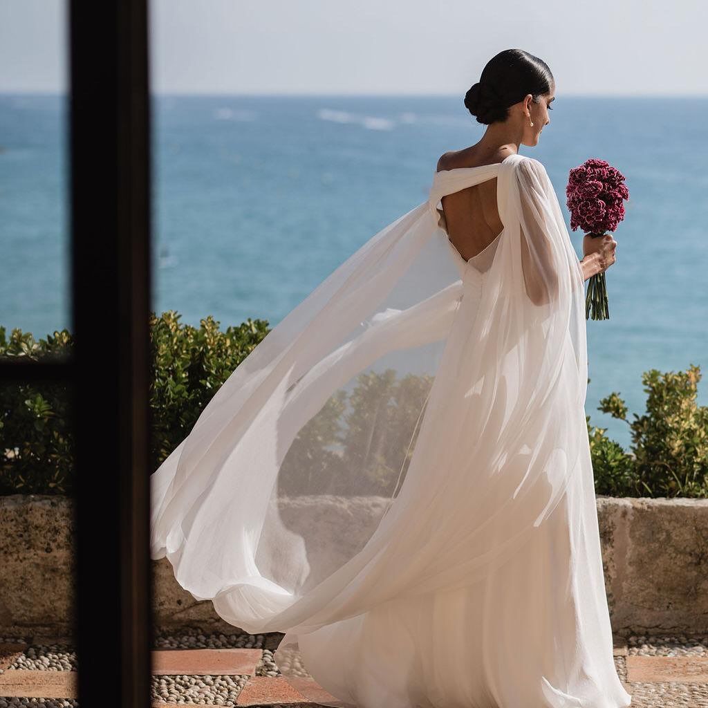 Espaldas de novia impresionantes asimétrica