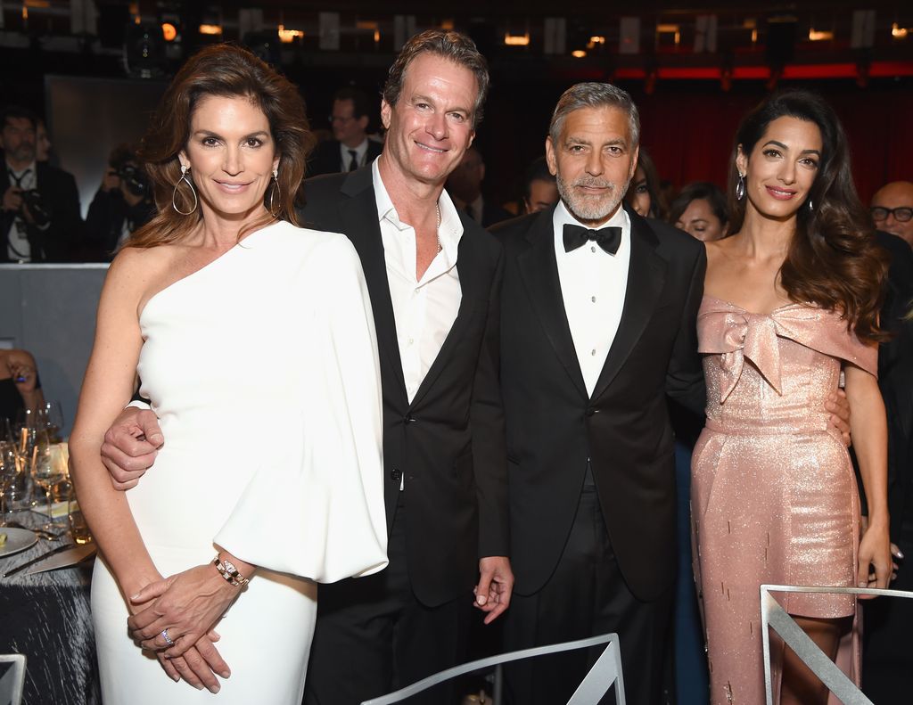 Cindy Crawford, Rande Gerber, George Clooney y Amal Clooney asisten a la 46.ª gala de homenaje del American Film Institute a George Clooney por su trayectoria (Life Achievement Award), celebrada en el Dolby Theatre el 7 de junio de 2018 en Hollywood, California.