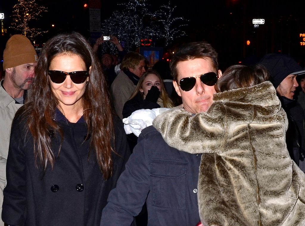 Katie Holmes, Tom Cruise y su hija, Suri Noelle, en el año 2011