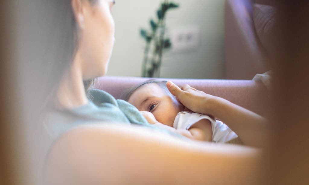 Mother breastfeeding her baby