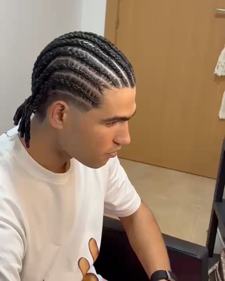 El tenista ha optado por trenzas de raíz (o boxeador)