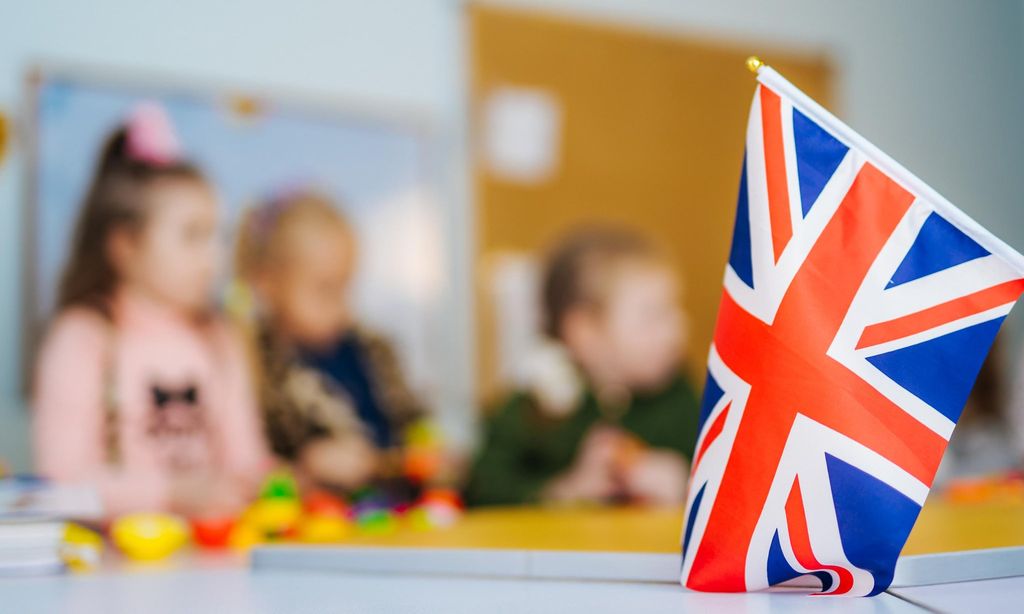Learn English. School Children. Education in the United Kingdom. Flag of Great Britain.