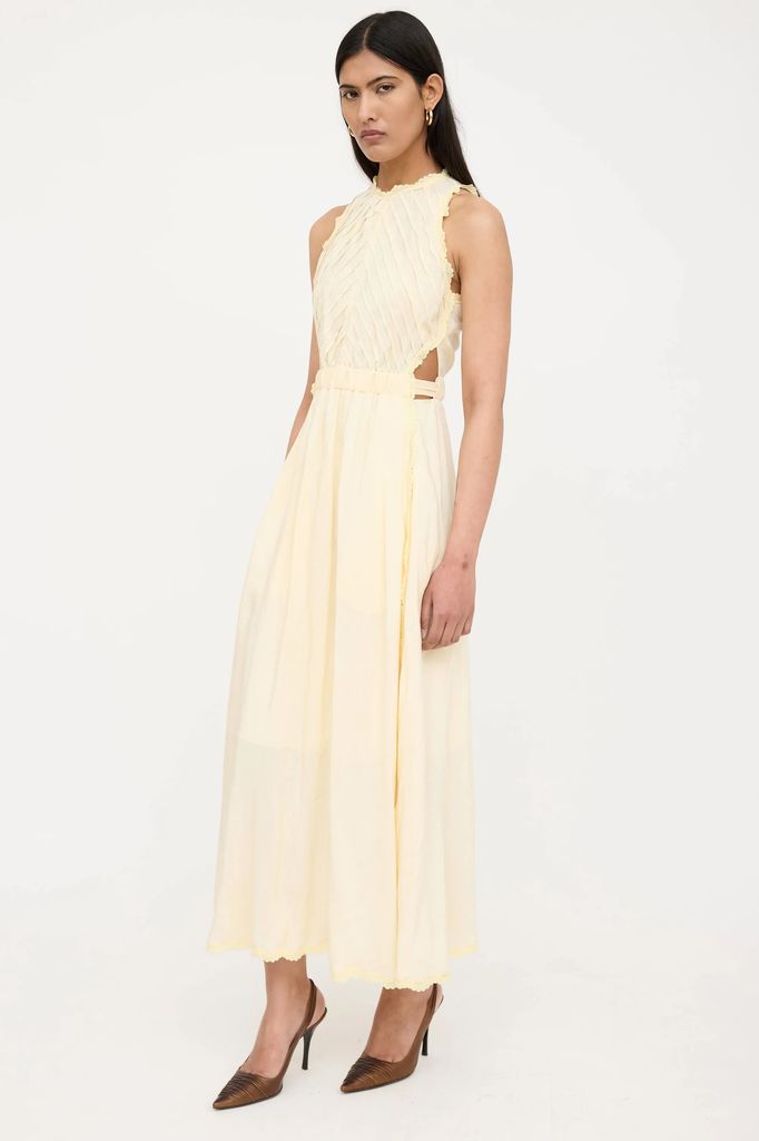 Vestido de lino y encaje de Sandro.