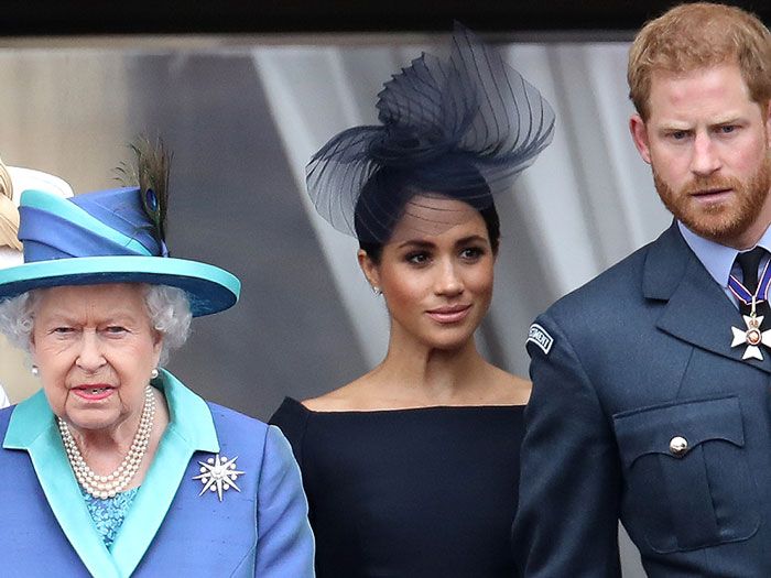 Harry y Meghan con la fallecida Isabel II 
