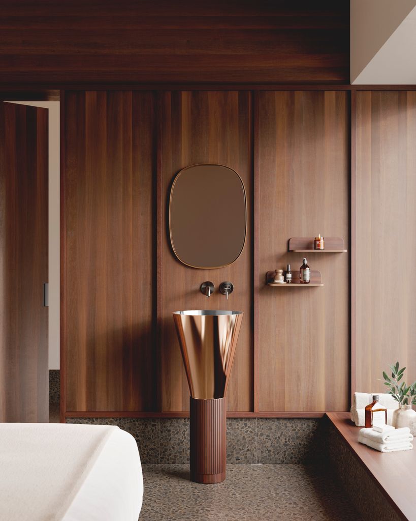 Lavabo de pie con la base estrechada y recipiente cónico