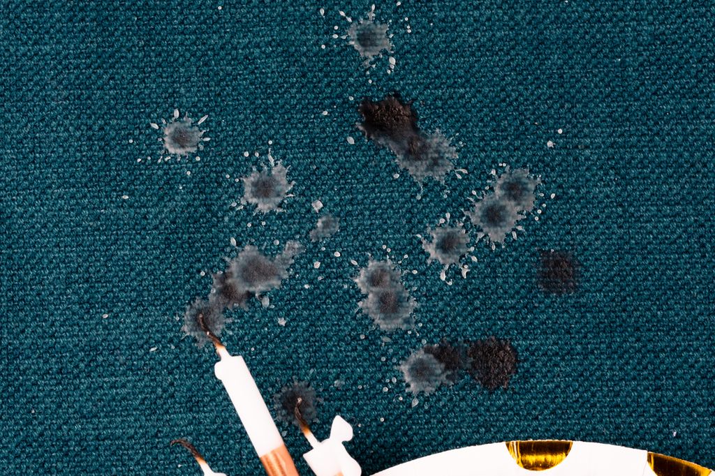 Manchas de cera de vela.