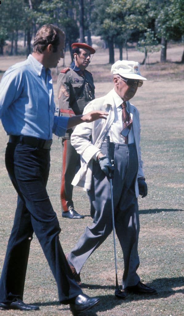 SPAIN - JANUARY 01:  La Coruna - La Zapateira - Spain - Francisco Franco playing golf with te prince Juan Carlos de Borbon  (Photo by Gianni Ferrari/Cover/Getty Images)