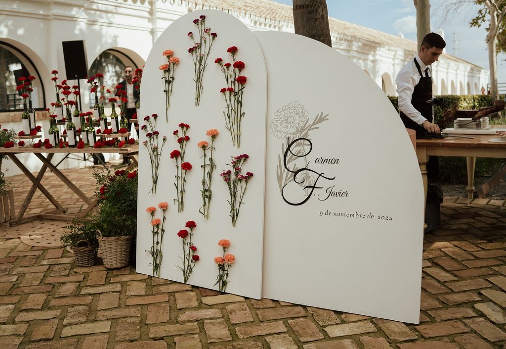 Decoración de bodas con claveles rincón de bienvenida