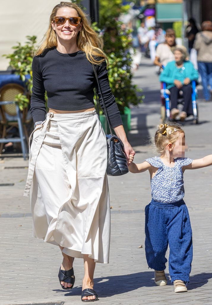 Actress Amber Heard and daughter Oonagh Paige Heard in Madrid. September 18 2024
