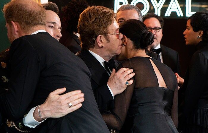 Meghan y Harry con Elton John y David Furnish