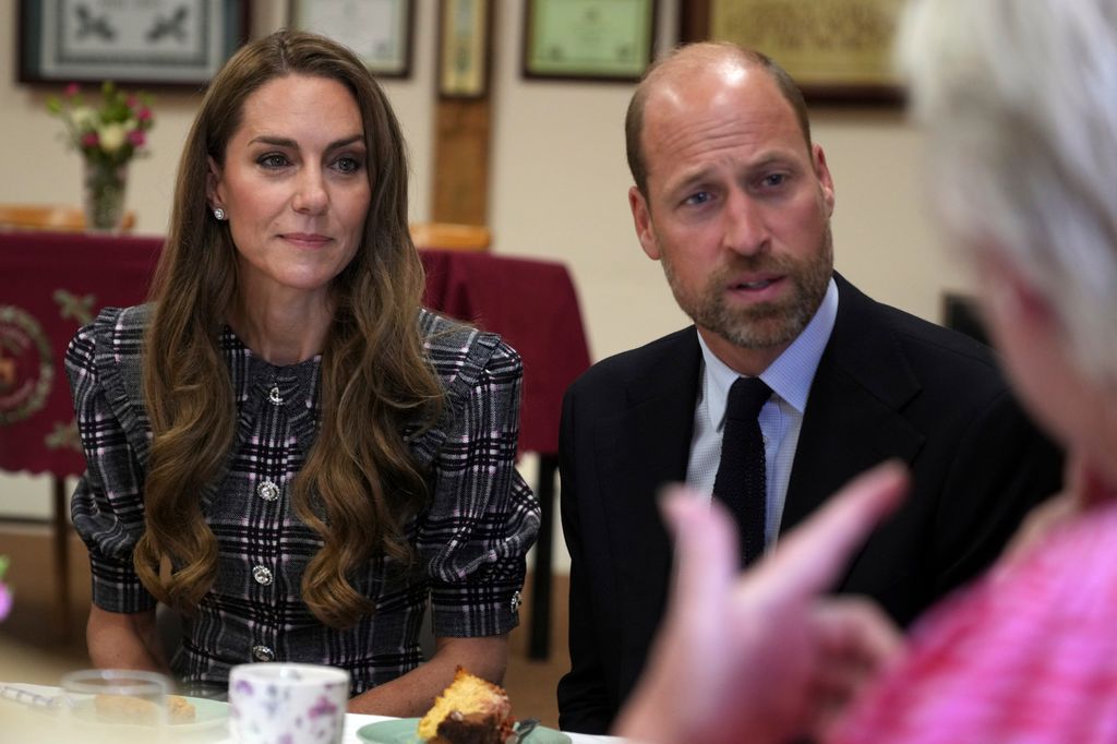 La princesa Kate y el príncipe William en una visita al Instituto de la Federación Nacional de Mujeres, en en Sunningdale, Inglaterra, este 8 de septiembre.