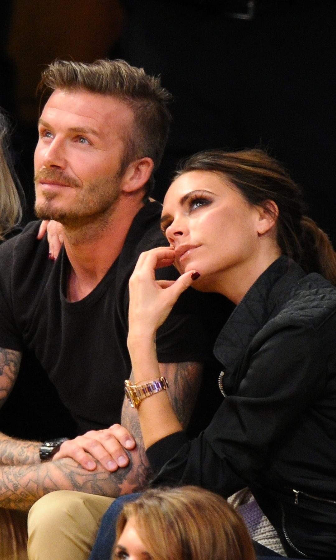  David Beckham y Victoria Beckham viendo baloncesto en los Angeles, en 2012
