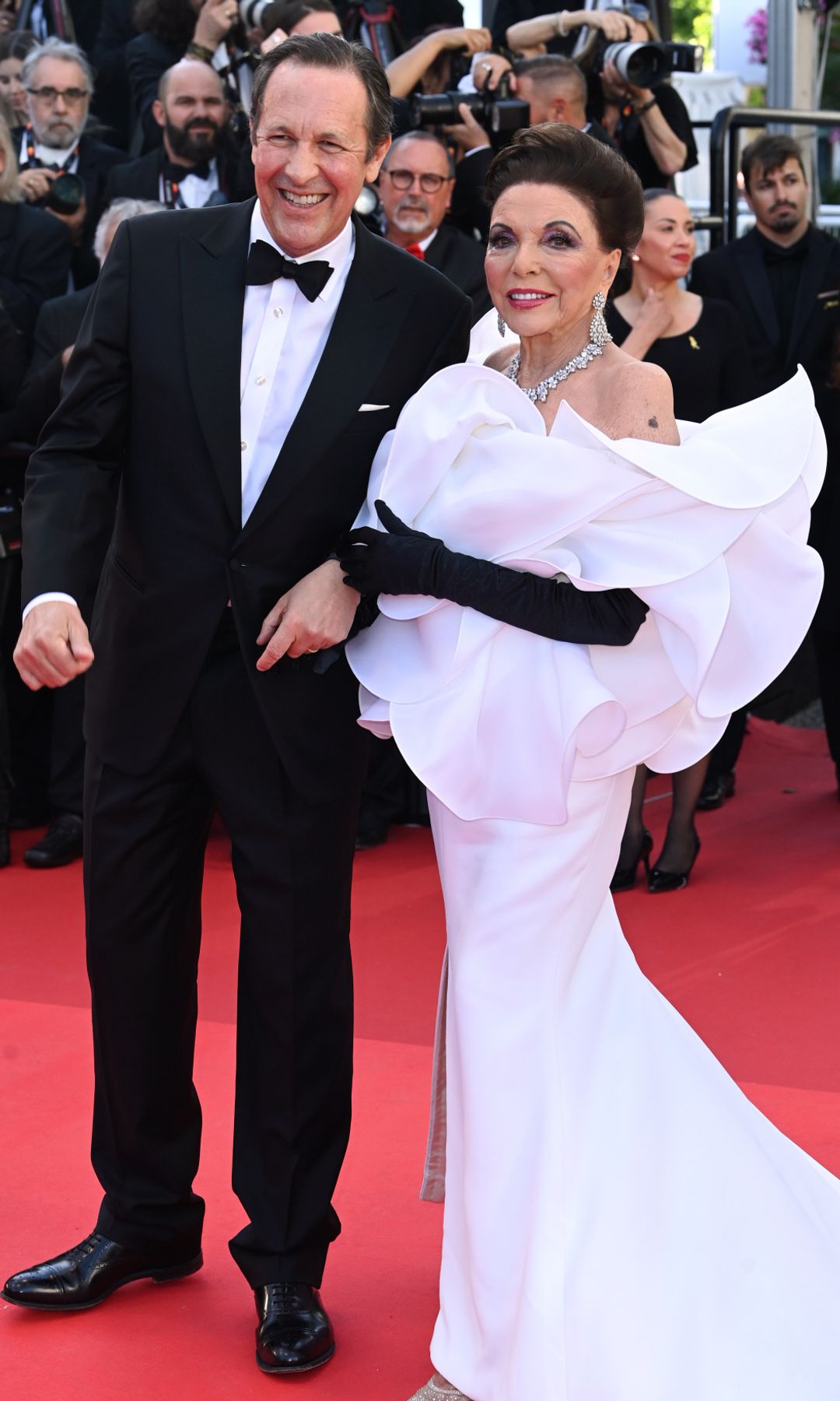 Joan Collins y su marido Percy Gilson