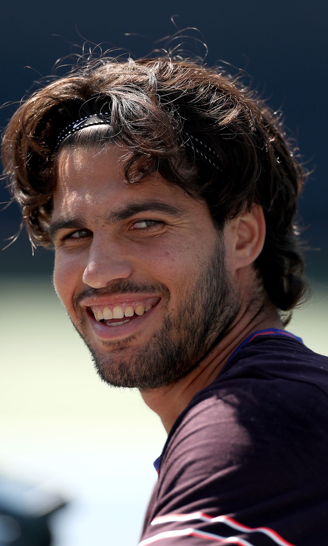 NEW YORK, NEW YORK - AUGUST 25: Carlos Alcaraz of Spain reacts in a practice session during Fan Week at the USTA Billie Jean King National Tennis Center on August 25, 2026 in the Flushing neighborhood of the Queens borough of New York City