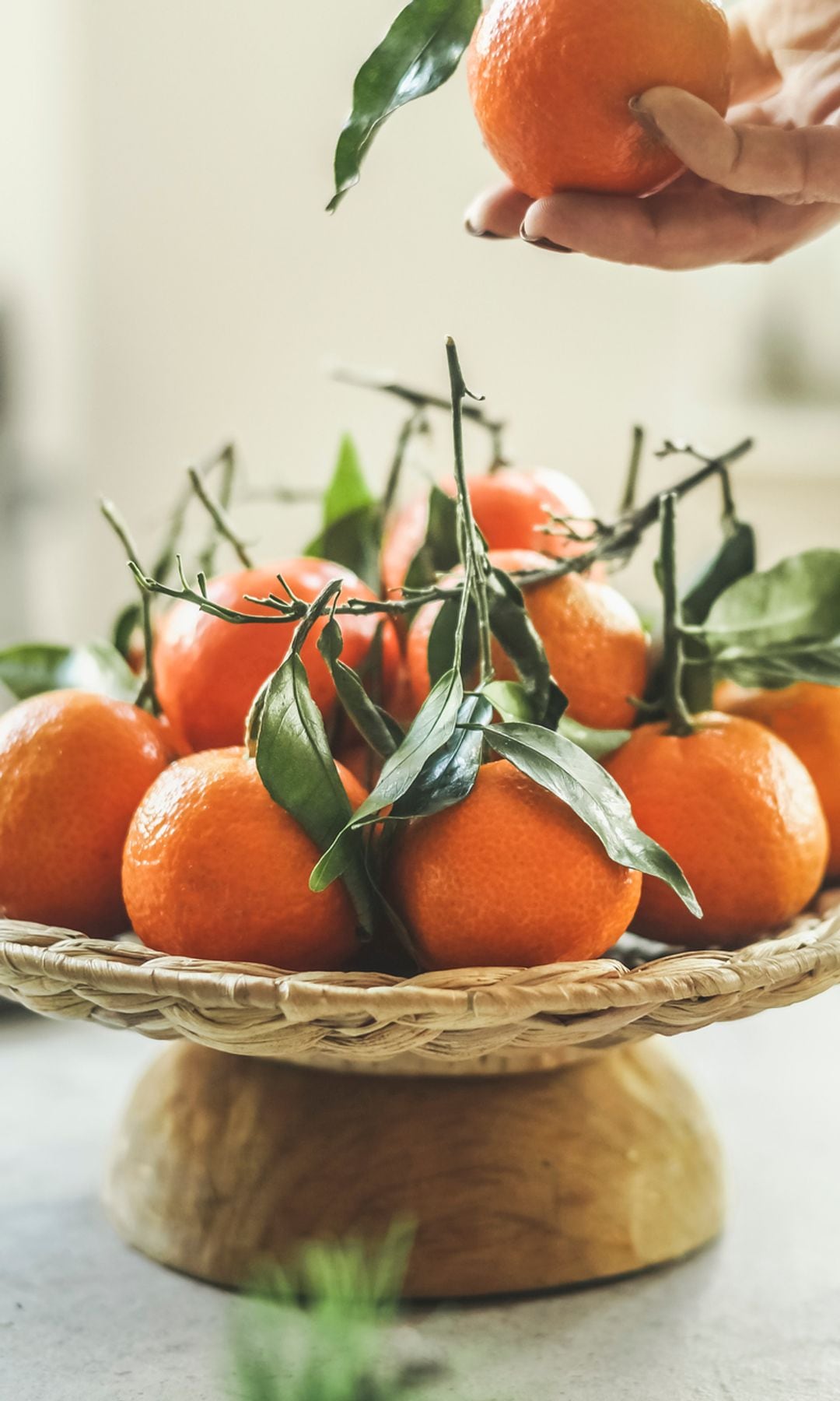 Una fuente de naranjas, que son alimentos que ayudan a prevenir las infecciones respiratorias