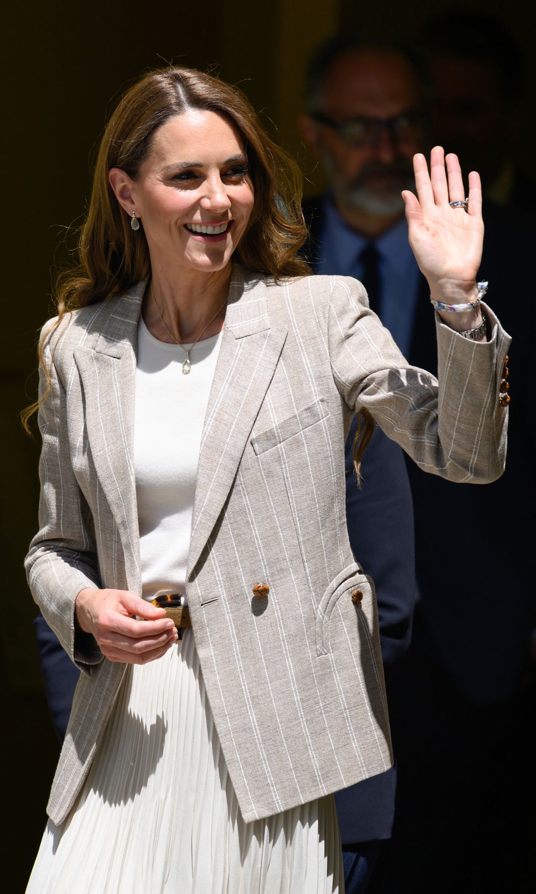 Kate saludando al público