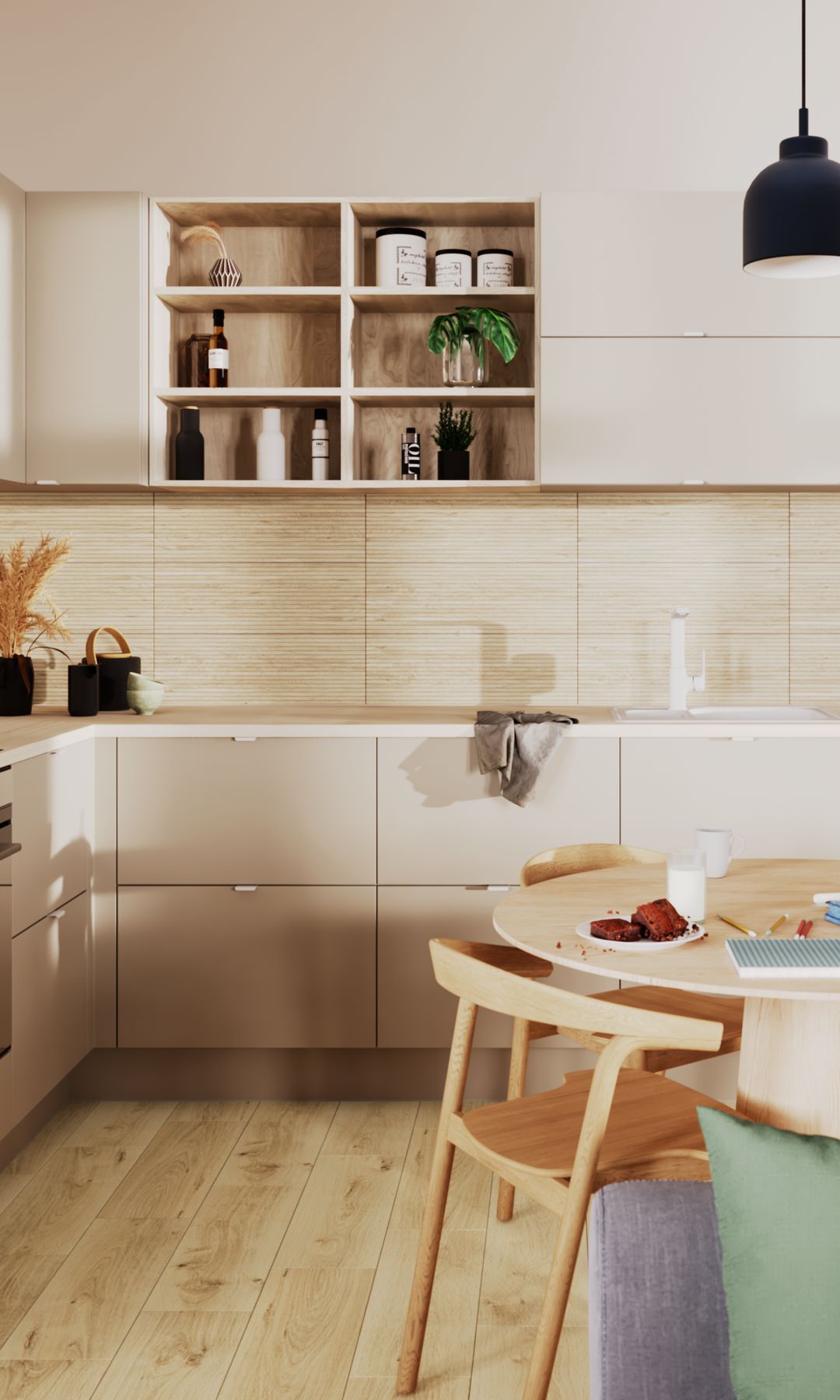 Cocina con comedor con mesa redonda, muebles color topo, lámpara de techo negra, sillas de madera