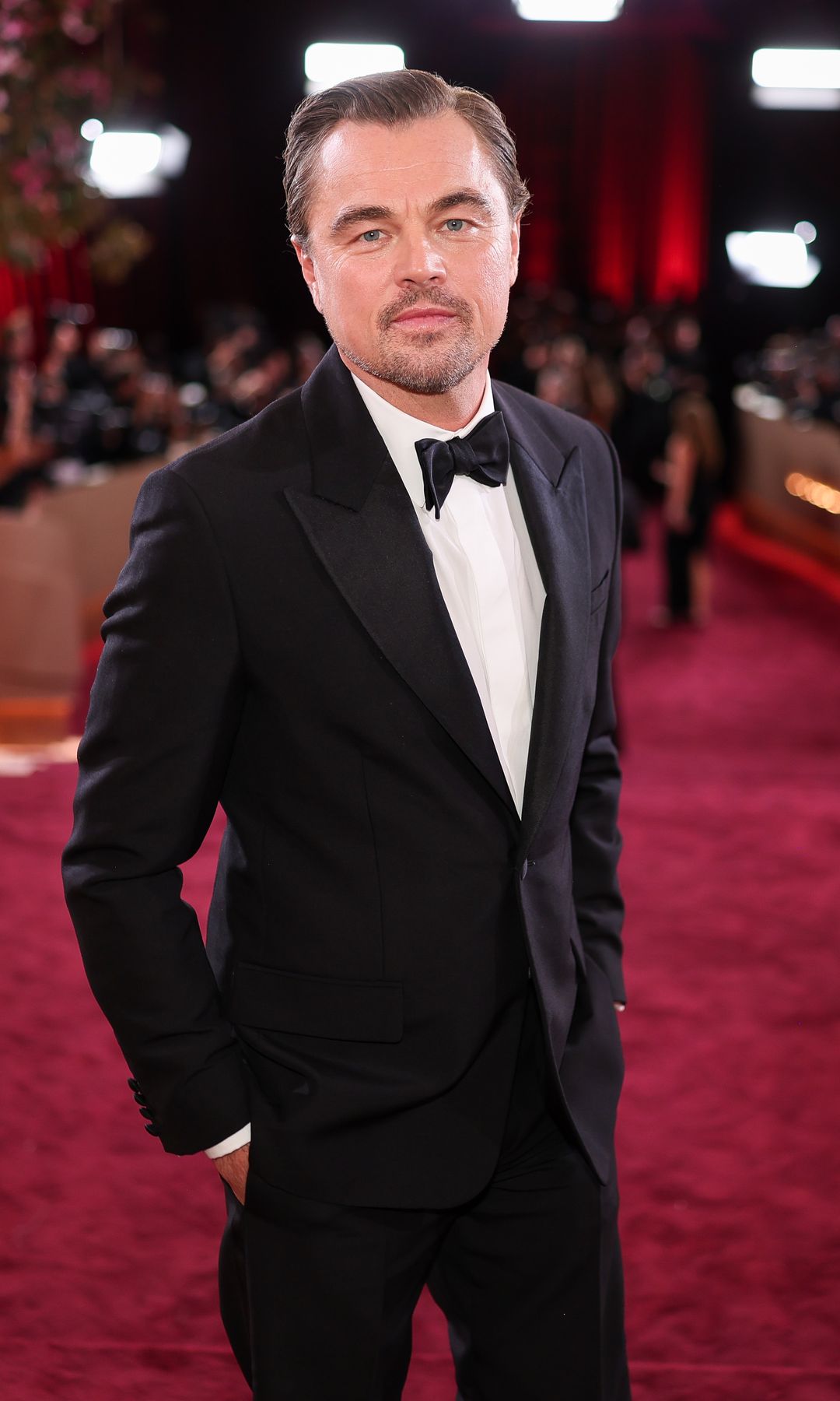 Sobre estas líneas, el actor Leonardo DiCaprio en la gala de los Globos de Oro, el pasado domingo 11 de enero