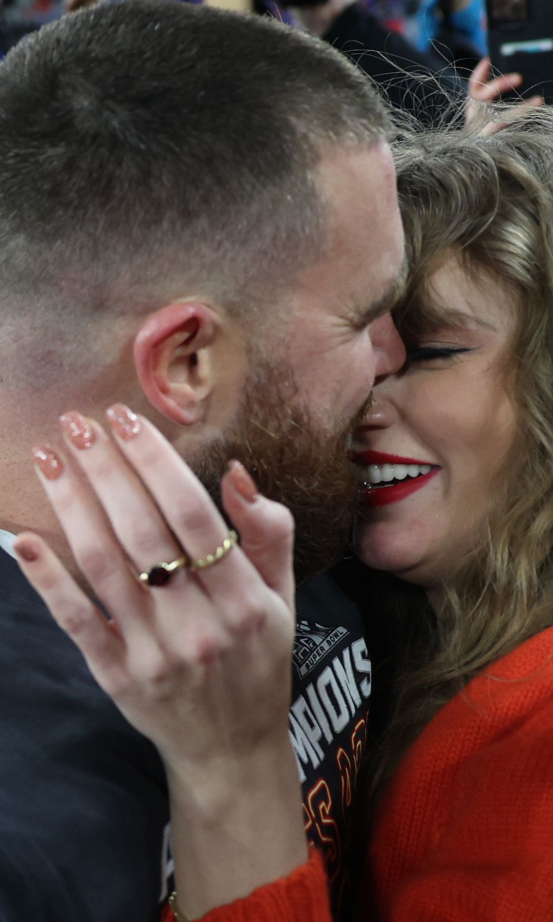 BALTIMORE, MARYLAND - JANUARY 28: Travis Kelce #87 of the Kansas City Chiefs embraces Taylor Swift after a 17-10 victory against the Baltimore Ravens in the AFC Championship Game at M&T Bank Stadium on January 28, 2024 in Baltimore, Maryland