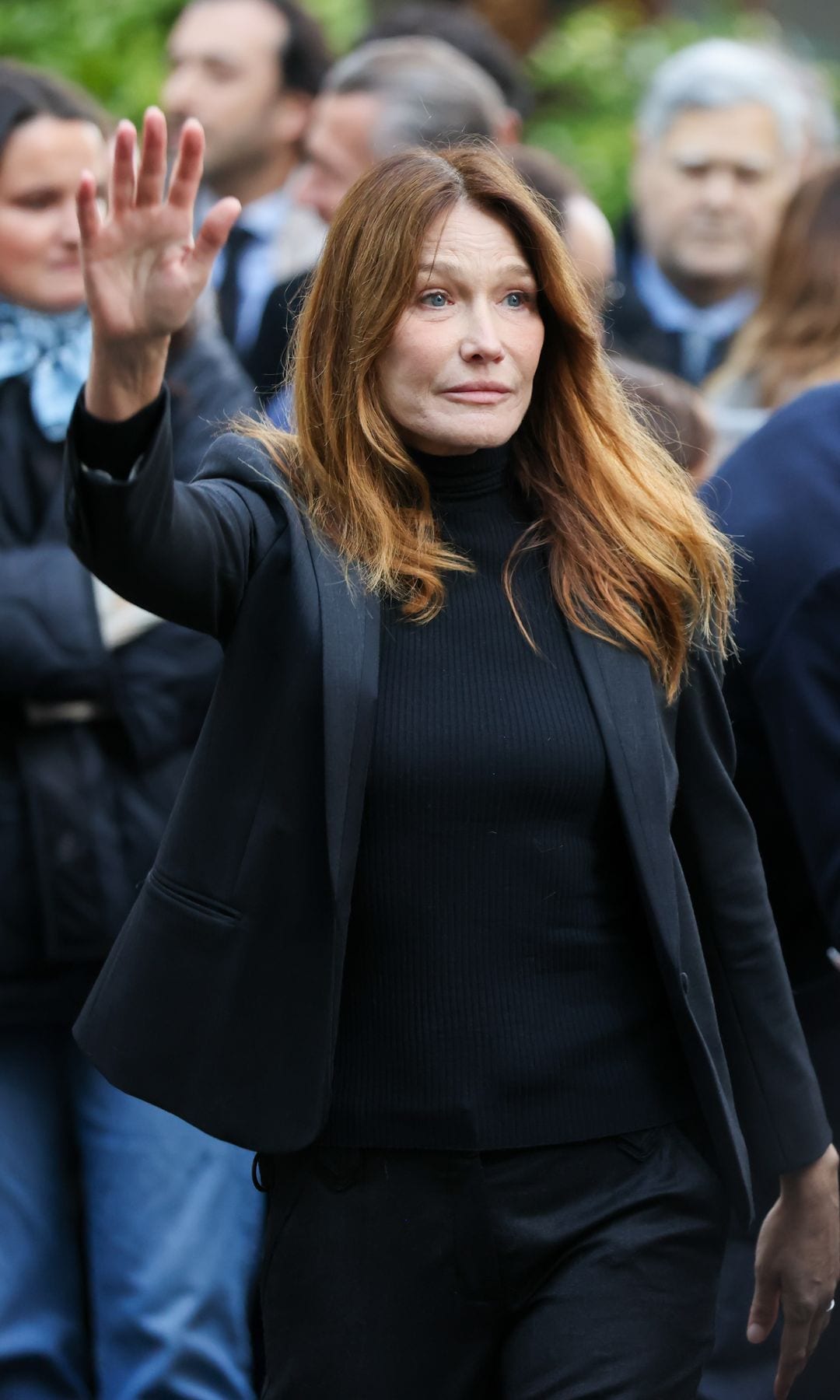 PARIS, FRANCE - OCTOBER 21: Carla Bruni is seen outside her home on October 21, 2025 in Paris, France. The former French president (2007 and 2012) will serve five years for criminal conspiracy in SantÃ© prison, Paris, over a scheme to obtain election campaign funds from the regime of the late Libyan dictator Colonel Gaddafi. Sarkozy is the first former head of an EU country to serve time in prison, and the first French postwar leader to be jailed. His son, Louis, has organised a party of well wishers to see his Father off from their home. (Photo by Pierre Suu/Getty Images)