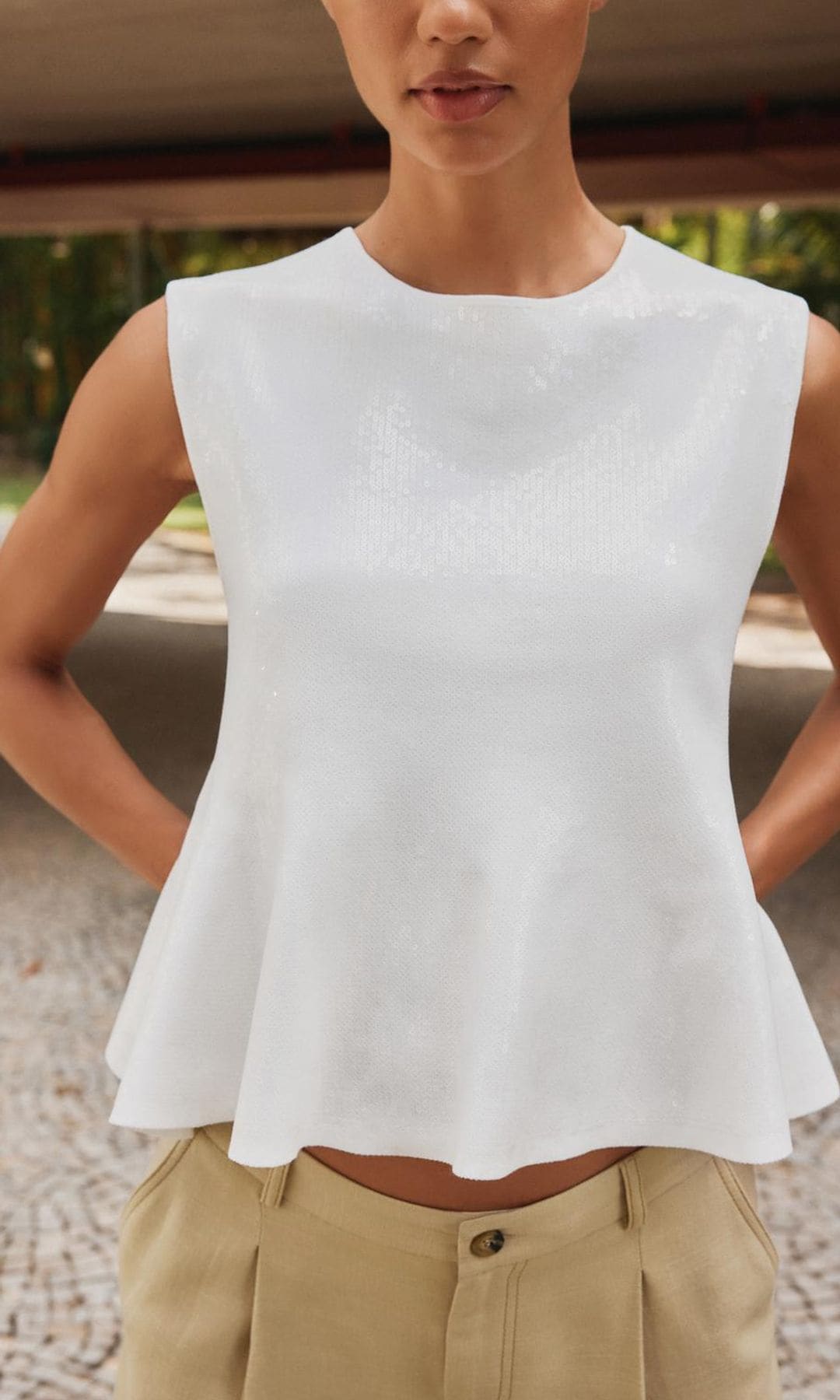 Top peplum de punto y lentejuelas