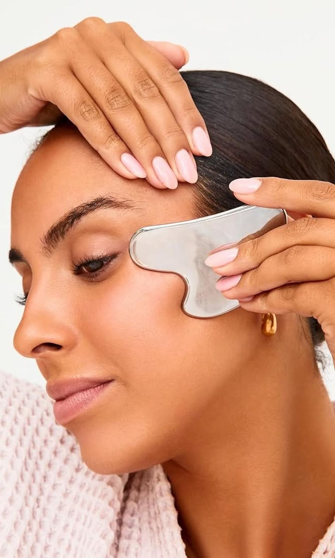 gua sha rostro técnica masaje facial drenaje linfático dirección correcta