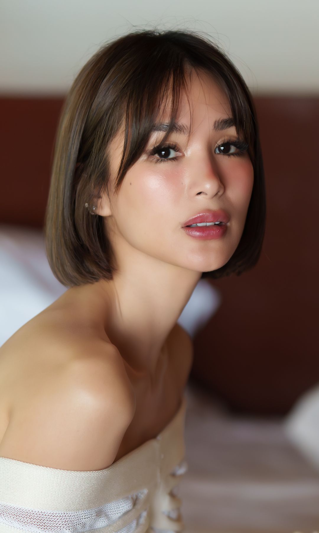  Mujer con cabello corto y flequillo cortina