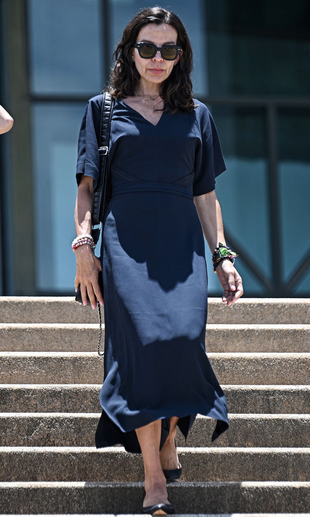 Silvia Bronchalo (R) leaves court after her son Daniel Sancho Bronchalo was handed a life sentence for the murder of Colombian plastic surgeon Edwin Arrieta Arteaga on the island of Koh Pha Ngan in August 2023, at the Koh Samui Provincial Court on August 29, 2024. (Photo by Lillian SUWANRUMPHA / AFP) (Photo by LILLIAN SUWANRUMPHA/AFP via Getty Images)