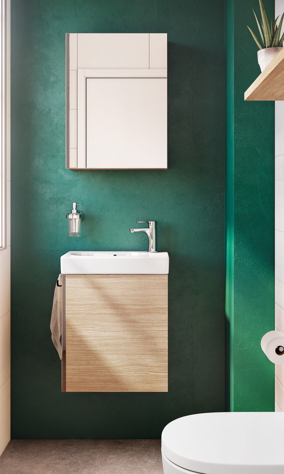 Aseo de cortesía con paredes verdes, ventana, mueble de baño suspendido de madera con lavabo integrado, espejo rectangular, balda sobre el sanitario