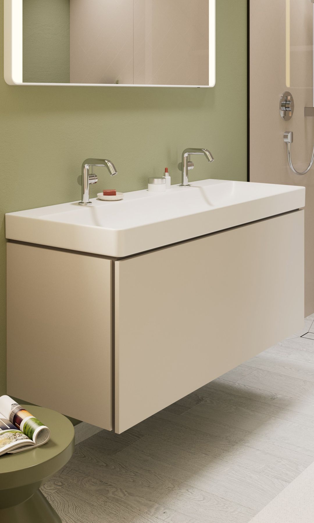 Baño con ducha, paredes verdes, espejo, mueble bajolavabo de color blanco suspendido, mampara de cristal, taburete 