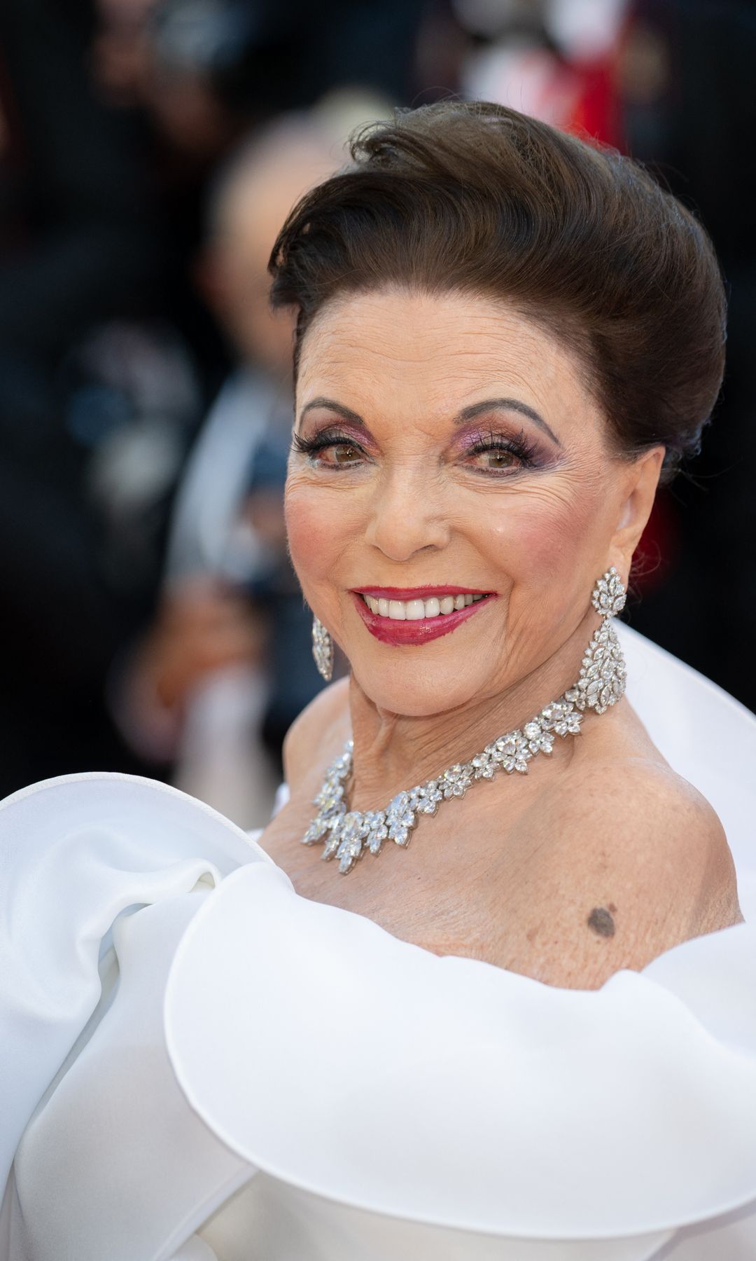 Perfil de Joan Collins en Cannes